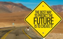 The Best Way To Predict The Future Is To Create It sign on desert road